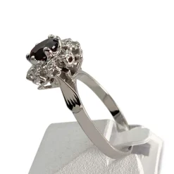 Bague d'occasion or 750 blanc grenat et diamants