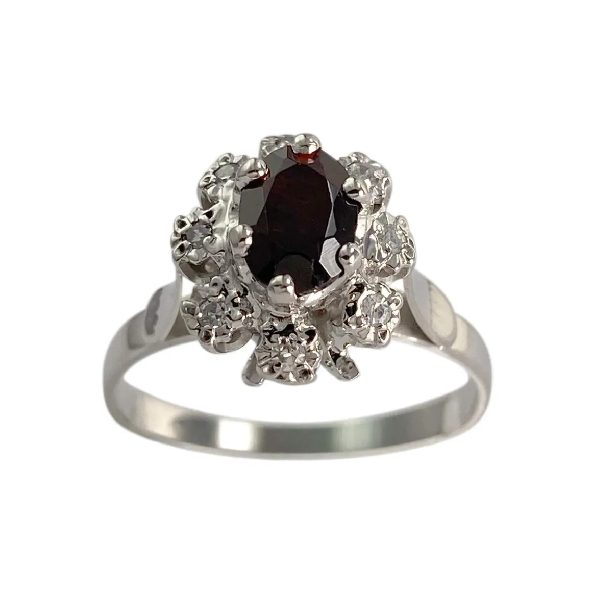 Bague d'occasion or 750 blanc grenat et diamants