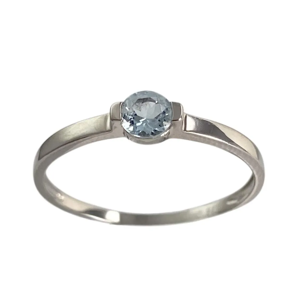 Bague d'occasion or 375 blanc topaze bleue traitée