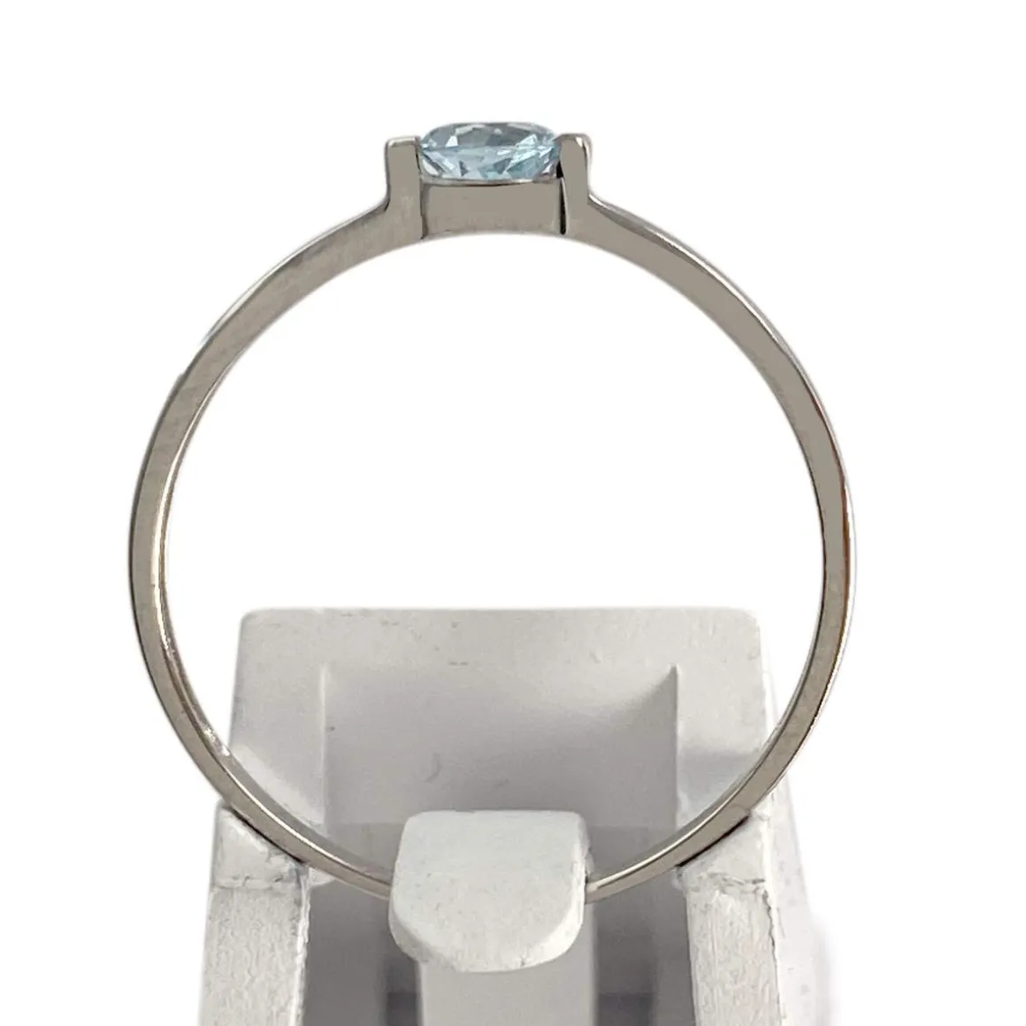 Bague d'occasion or 375 blanc topaze bleue traitée