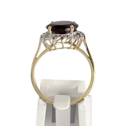 Bague d'occasion 2 ors 750 grenat diamants