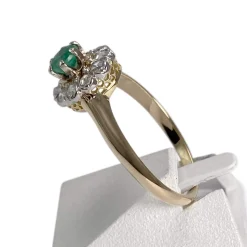 Bague d'occasion or 2 tons 750 emeraude diamant