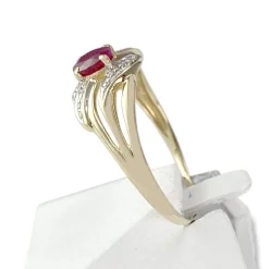 Bague d'occasion or 750 2 tons rubis diamants