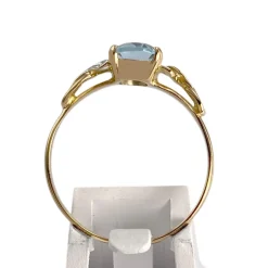 Bague d'occasion or 750 2 tons topaze bleue traitée