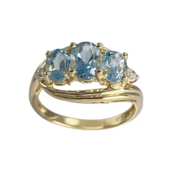 Bague d'occasion or 750 2 tons topazes bleues traitées diamants