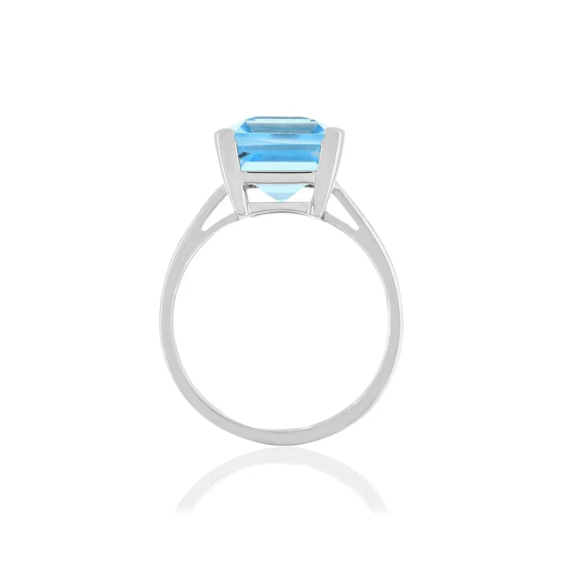 Bague or blanc 750, 1 topaze bleue traitée de 10,50 carats.