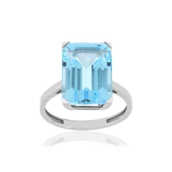 Bague or blanc 750, 1 topaze bleue traitée de 10,50 carats.