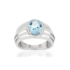 Bague or blanc 375, 1 topaze bleue traitée 1,75 carat.