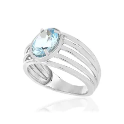 Bague or blanc 375, 1 topaze bleue traitée 1,75 carat.