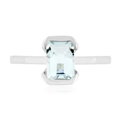 Bague or 375 blanc topaze bleue traitée