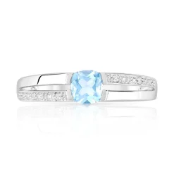 Bague or 375 blanc topaze bleue traitée et diamants