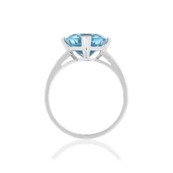 Bague or blanc 750, 1 topaze bleue traitée 5 carats.