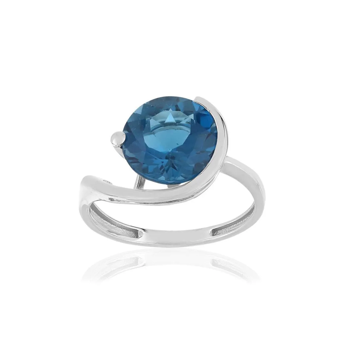 Bague or blanc 750, 1 topaze London Blue traitée de 5 carats.