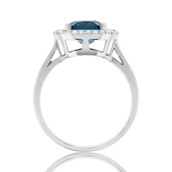 Bague or blanc 375 topaze London Blue traitée zirconias