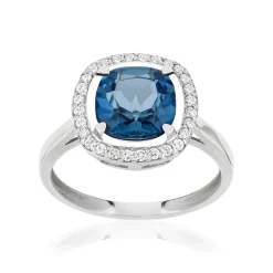 Bague or blanc 375 topaze London Blue traitée zirconias