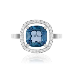Bague or blanc 375 topaze London Blue traitée zirconias