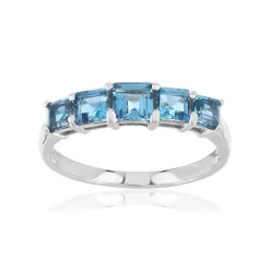 Bague or 375 blanc topazes bleues traitées