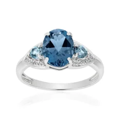 Bague or 375 blanc topazes bleues traitées