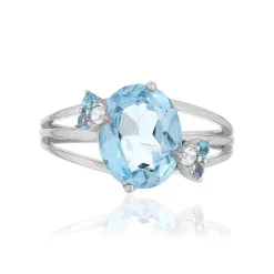 Bague or 375 blanc topazes bleues traitées et topazes blanches