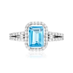 Bague or 750 blanc topaze traitée sky blue et zirconias