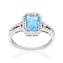 Bague or 750 blanc topaze traitée sky blue et zirconias