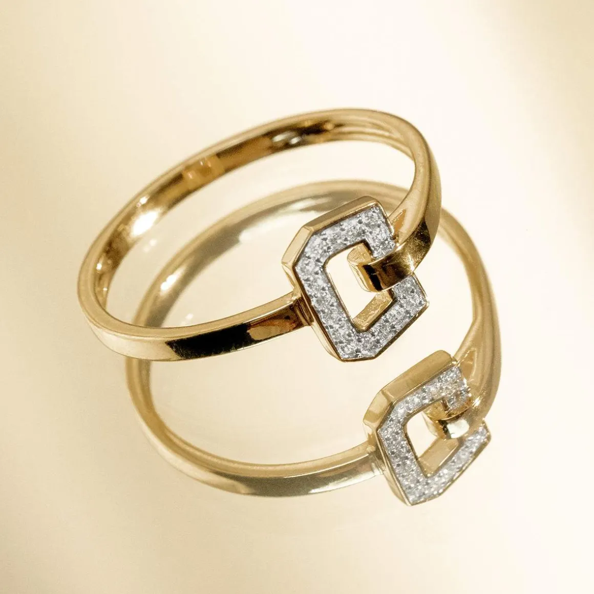 Bague or 750 jaune et boucle diamants