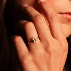 Bague or 750 jaune et boucle diamants