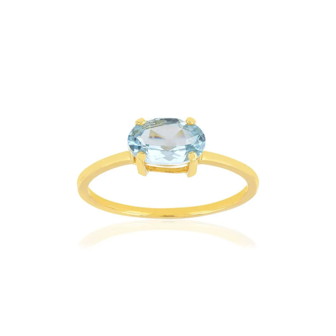 Bague or jaune 375 topaze bleue traitée ovale