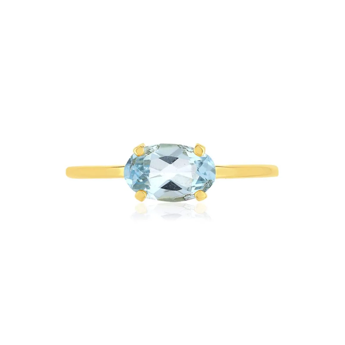 Bague or jaune 375 topaze bleue traitée ovale