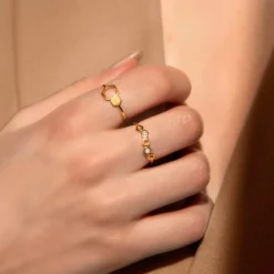 Bague or 375 jaune zirconias motif nids d'abeilles