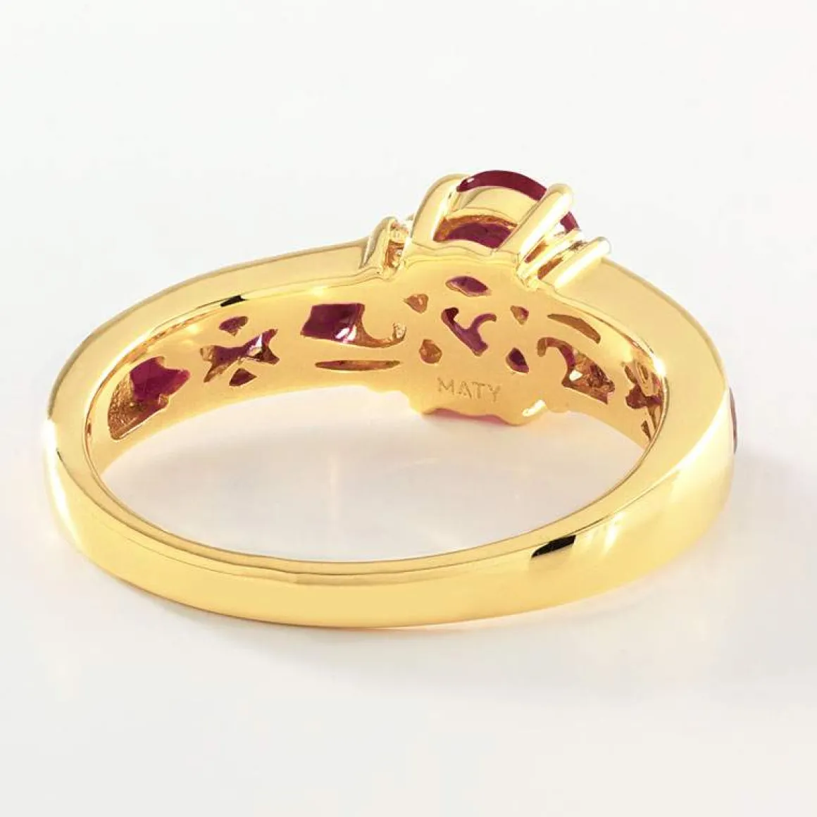 Bague or 750 2 tons rubis et diamants