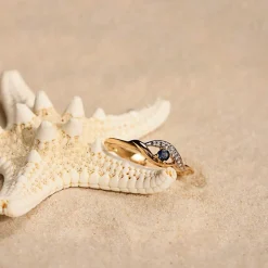 Bague or 375 2 tons saphir et zirconias