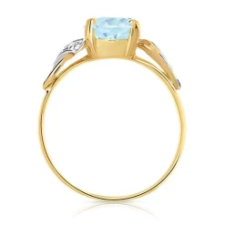 Bague or 750 2 tons topaze bleue traitée