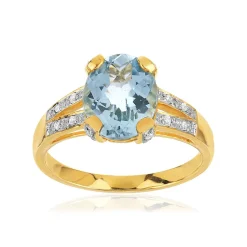 Bague or 375 2 tons topaze bleue traitée ovale et diamants