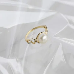 Bague or 375 2 tons torsadée perle de culture de Chine et diamants