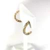 Boucles d'oreilles clous d'occasion or 750 jaune diamants