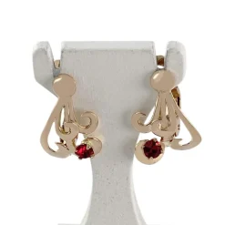 Boucles d'oreilles d'occasion or 750 jaune pierres rouges synthétiques