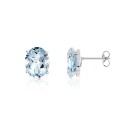 Boucles d'oreilles or 375 blanc topazes bleues traitées