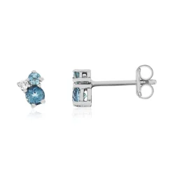 Boucles d'oreilles or 375 blanc topazes bleues traitées