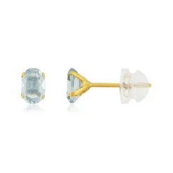 Boucles d'oreilles or 375 jaune topazes bleues traitées 1.09 carat