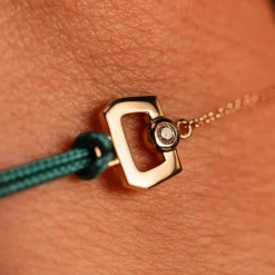 Bracelet boucle chaine or 750 jaune diamant et cordon vert 18cm