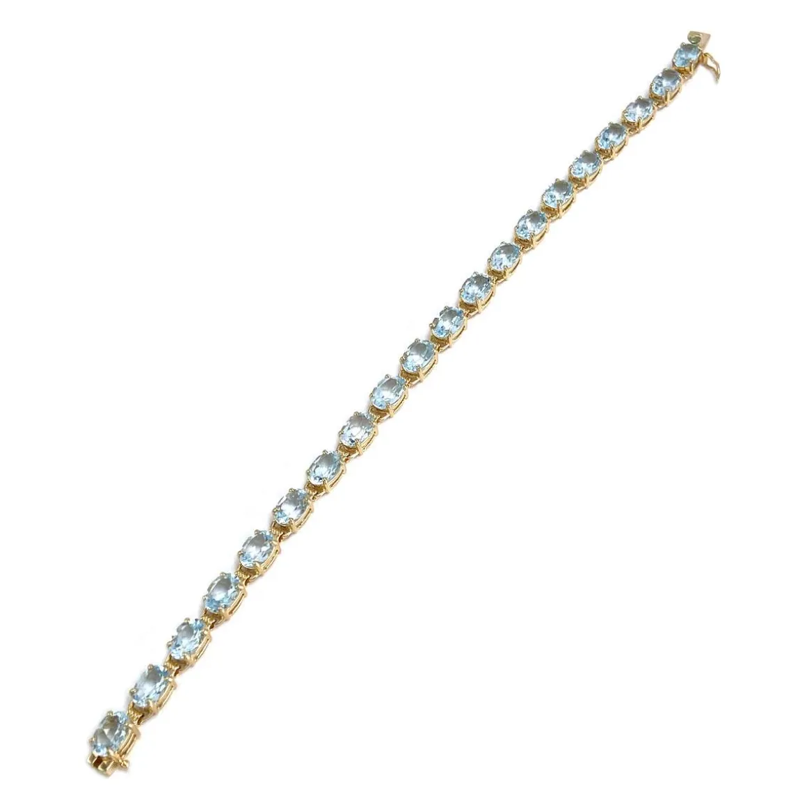 Bracelet d'occasion or 750 jaune topazes bleues traitées 19cm