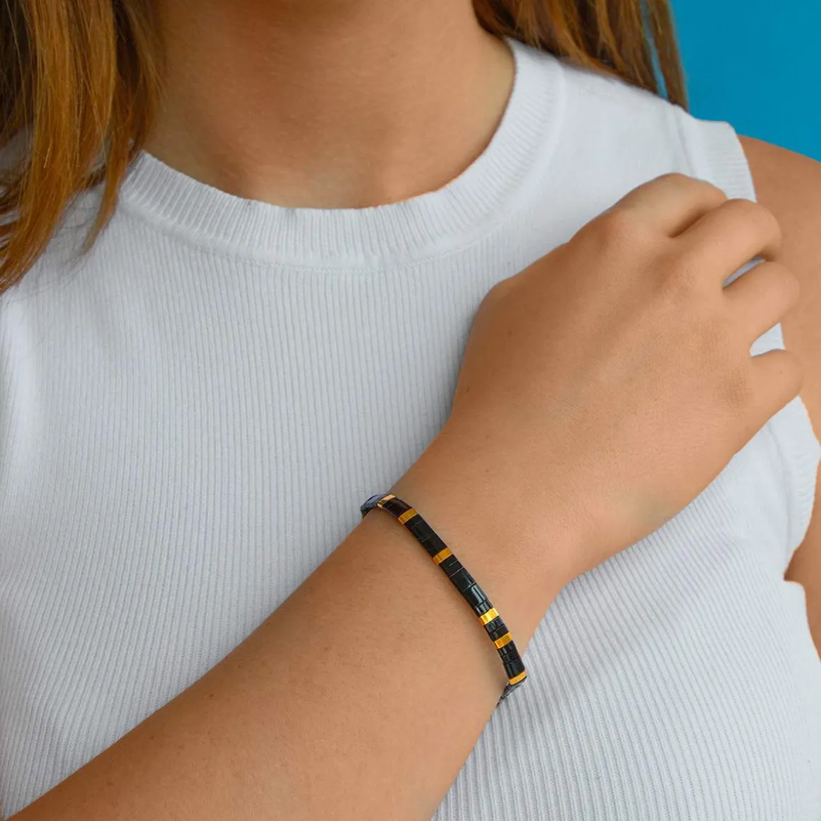 Bracelet élastique perles japonaises MIYUKI en verre émaillé ton noir et doré