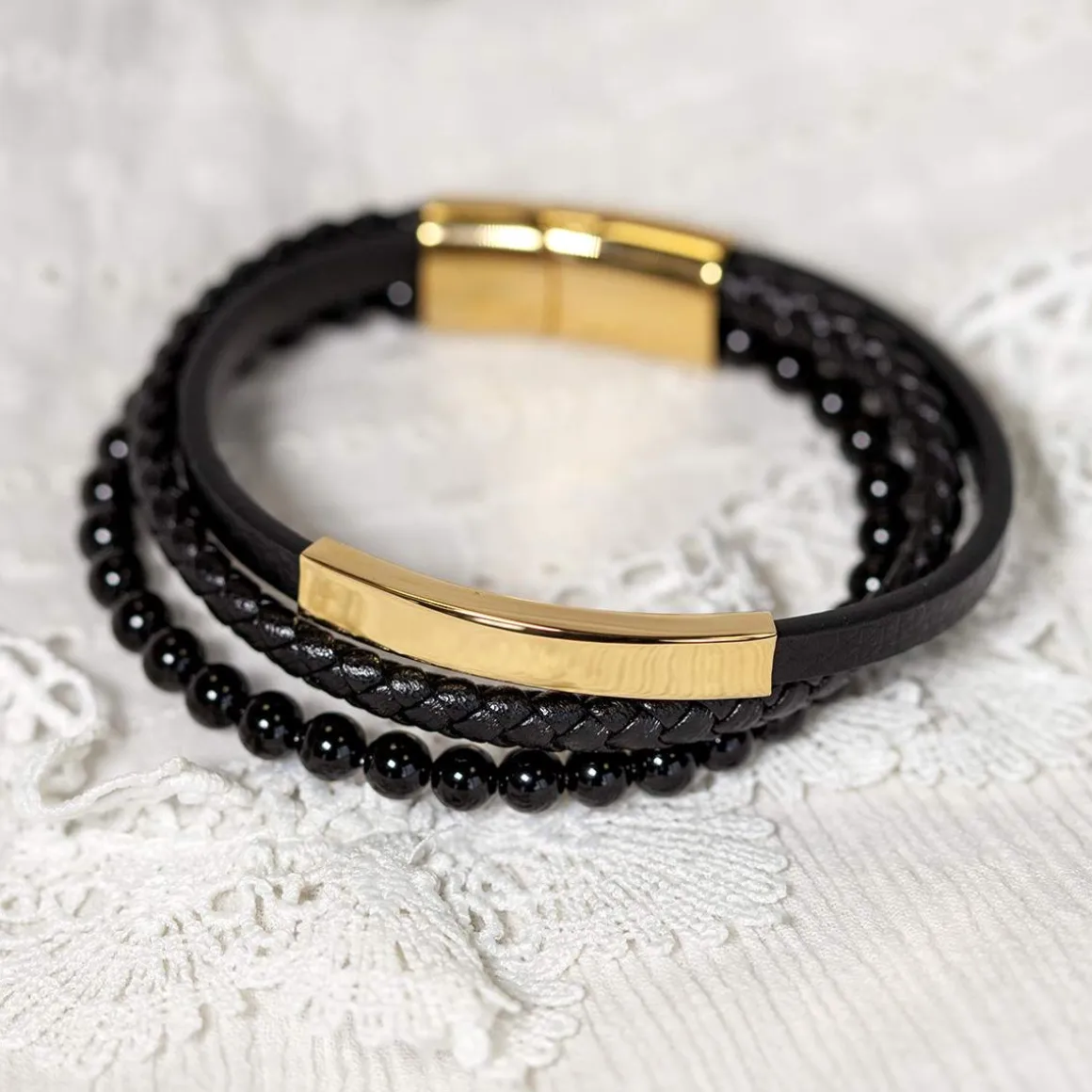 Bracelet multirang matière synthétique noire acier couleur jaune 21 cm