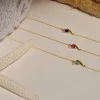 Bracelet or 375 jaune 2 tons émeraude et diamant 18cm avec anneau de raccourcissement 16cm