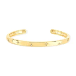 Bracelet plaqué or jaune, motif étoile zirconias. Diamètre 58 mm.