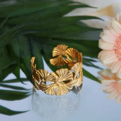 Bracelet rigide acier jaune motifs fleurs 60mm