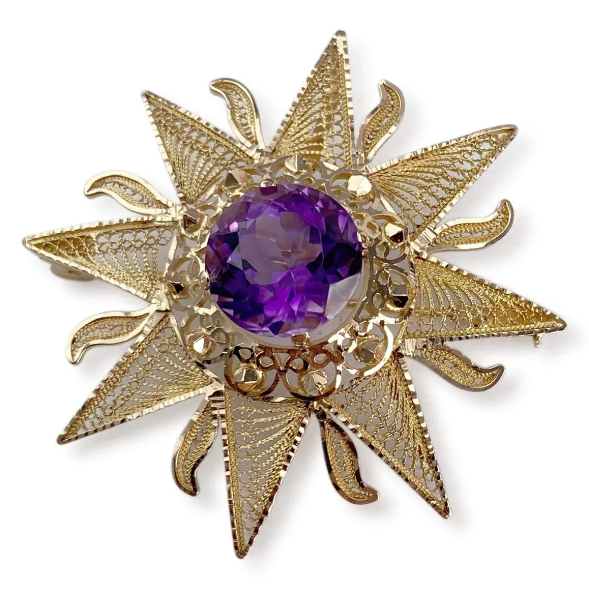 Broche d'occasion or 750 jaune améthyste