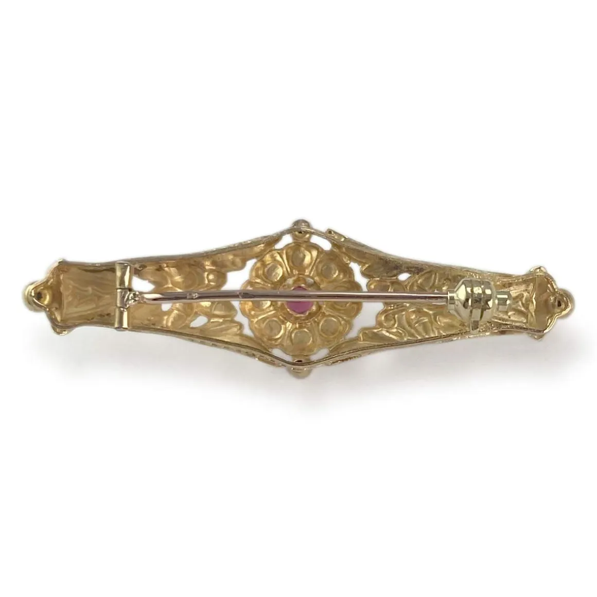 Broche d'occasion or 750 jaune doublet grenat verre