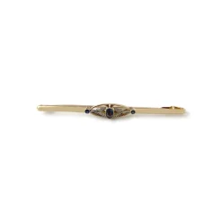 Broche d'occasion or 750 jaune et rhodié verres bleus
